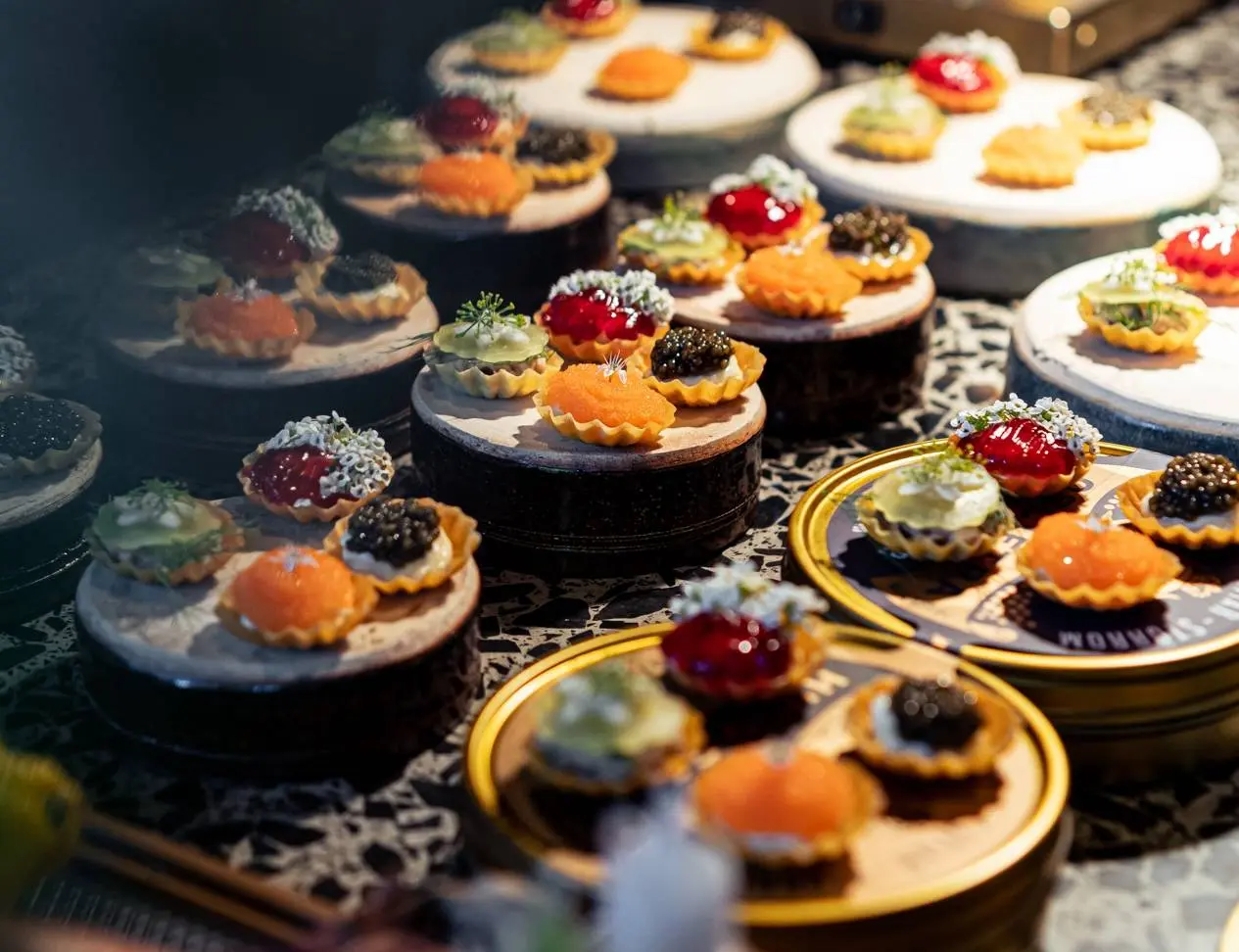 Chef preparing gourmet dishes for event catering